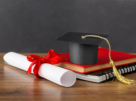 education-day-arrangement-with-graduation-cap.jpg